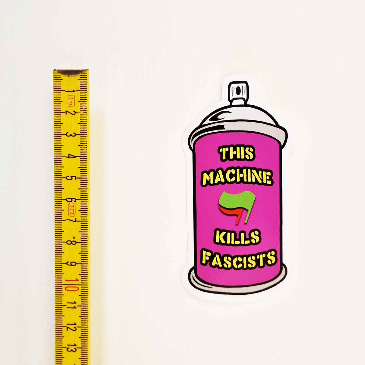 This Machine Kills Fascists Shaped Vinyl Sticker – Heavy Manners Artivism